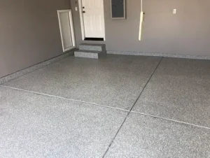 Smooth garage floor after epoxy restoration